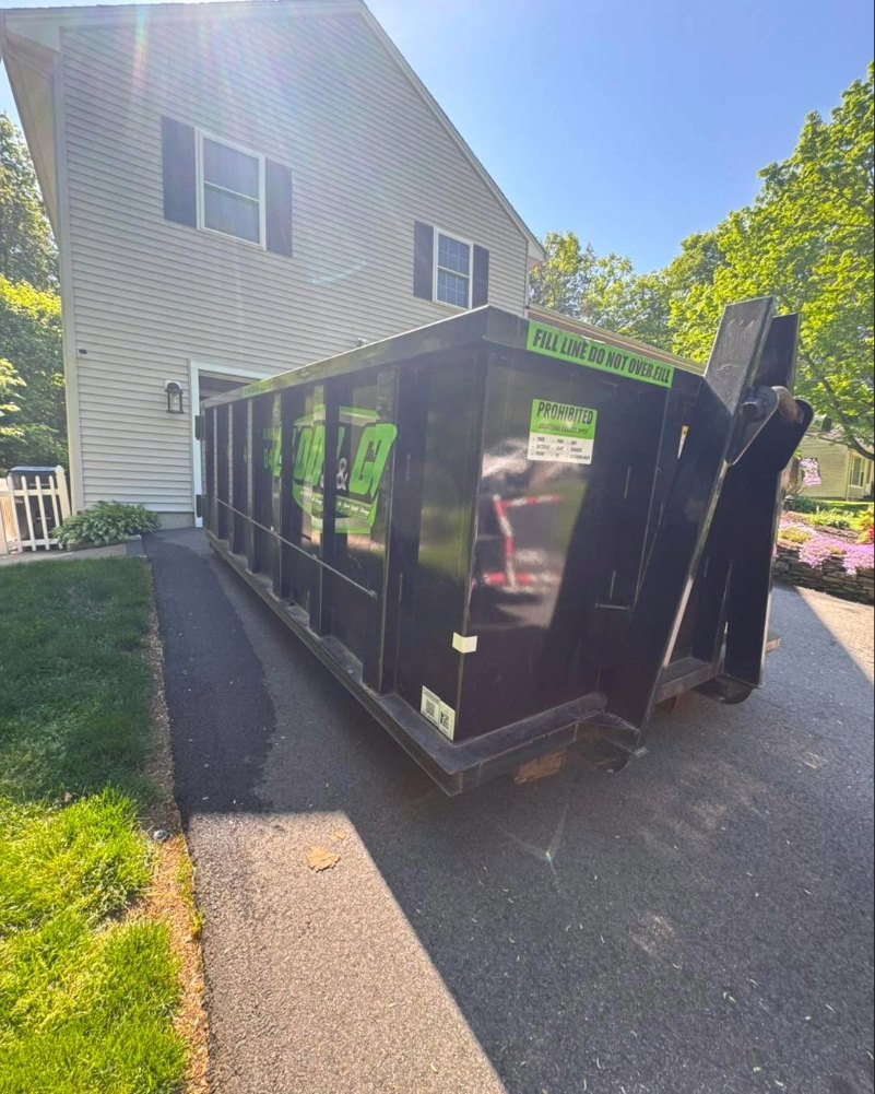 Load & Go Dumpster roll-off container on site
