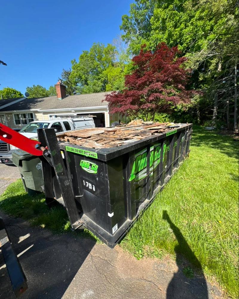 Load & Go Dumpster delivery truck in Connecticut