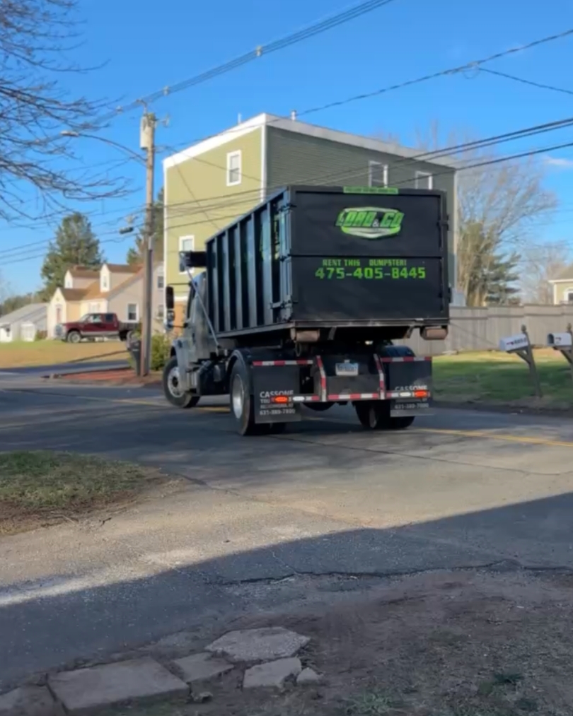 Load & Go Dumpster delivered to residential driveway