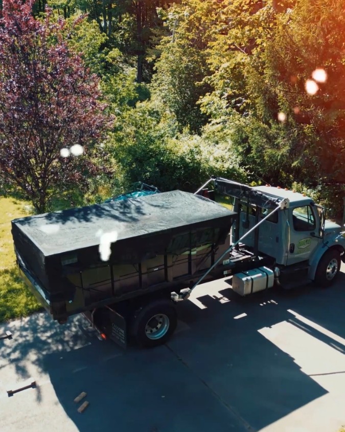 Load & Go Dumpster on contractor renovation site